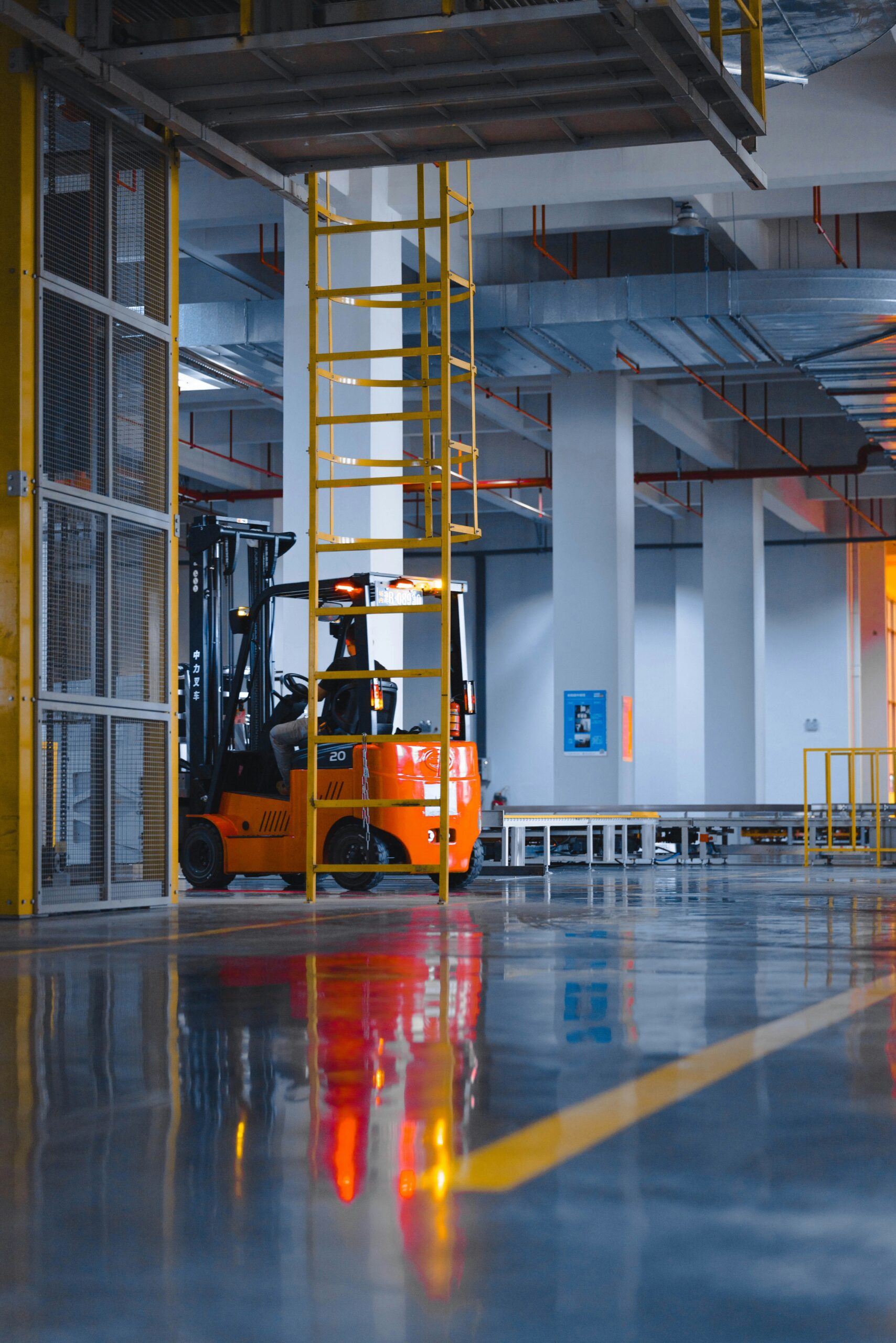 Forklift operating inside a commercial warehouse